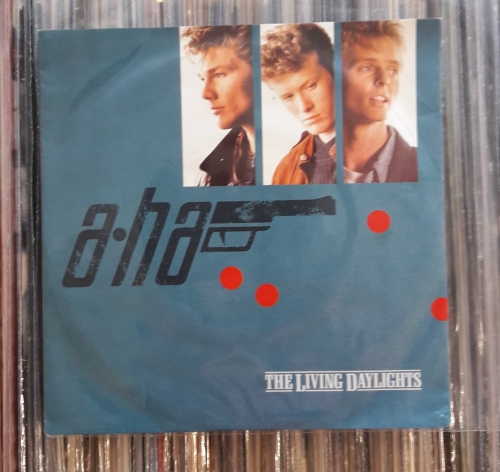 a-ha ‎– The Living Daylights Warner Bros. Records ‎– W8305 Vinyl, 7", 45 RPM, Single