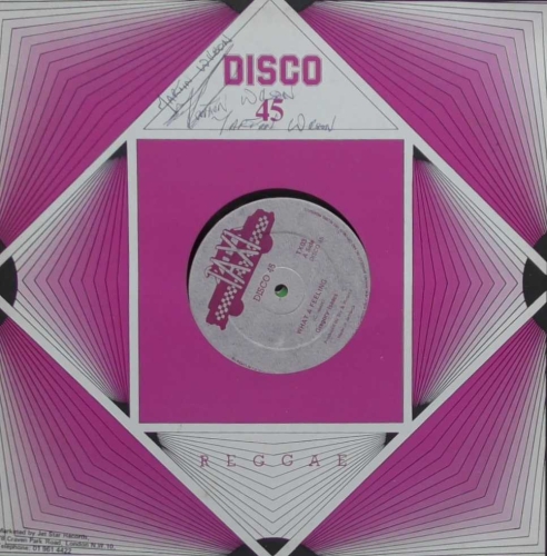 Gregory Isaacs ‎– What A Feeling Taxi ‎– TX03
