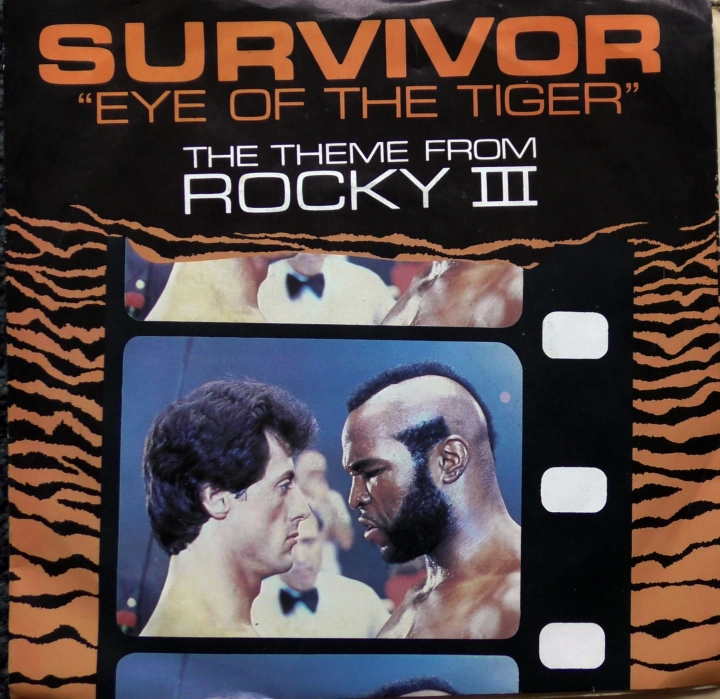 Survivor ‎– Eye Of The Tiger (The Theme From Rocky III) Scotti Bros. Records ‎– SCT A2411