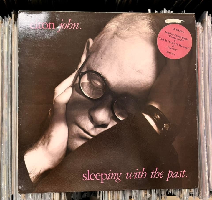 Elton John – Sleeping With The Past Label: The Rocket Record Company – 838 839-1