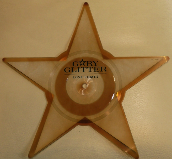 Gary Glitter – Love Comes Arista – ARISD 615